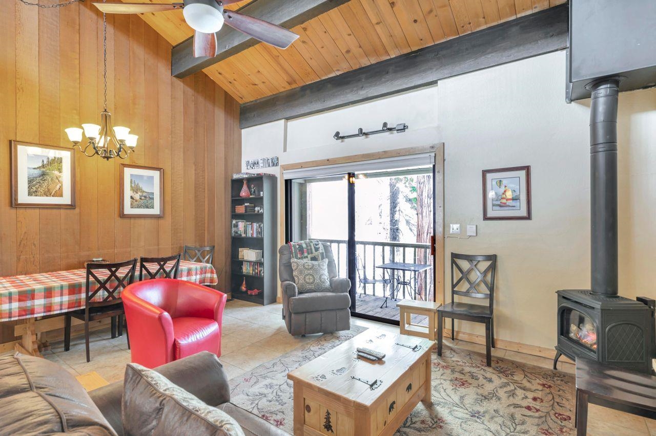 1001 Commonwealth Drive, Unit 156 Kings Beach, CA 96143 - Photo 3 of 21 a living room with furniture a rug and a window