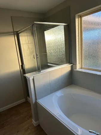 a view of a bathtub in a room