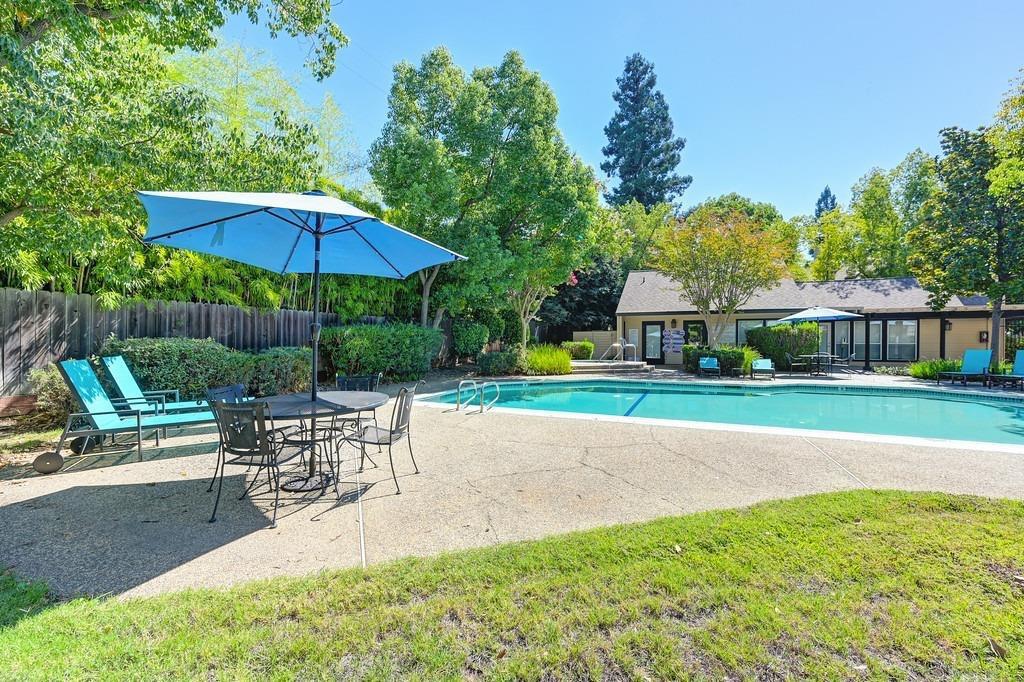 9237 Madison Avenue Orangevale, CA 95662 - Photo 34 of 40 a view of a house with backyard porch and sitting area