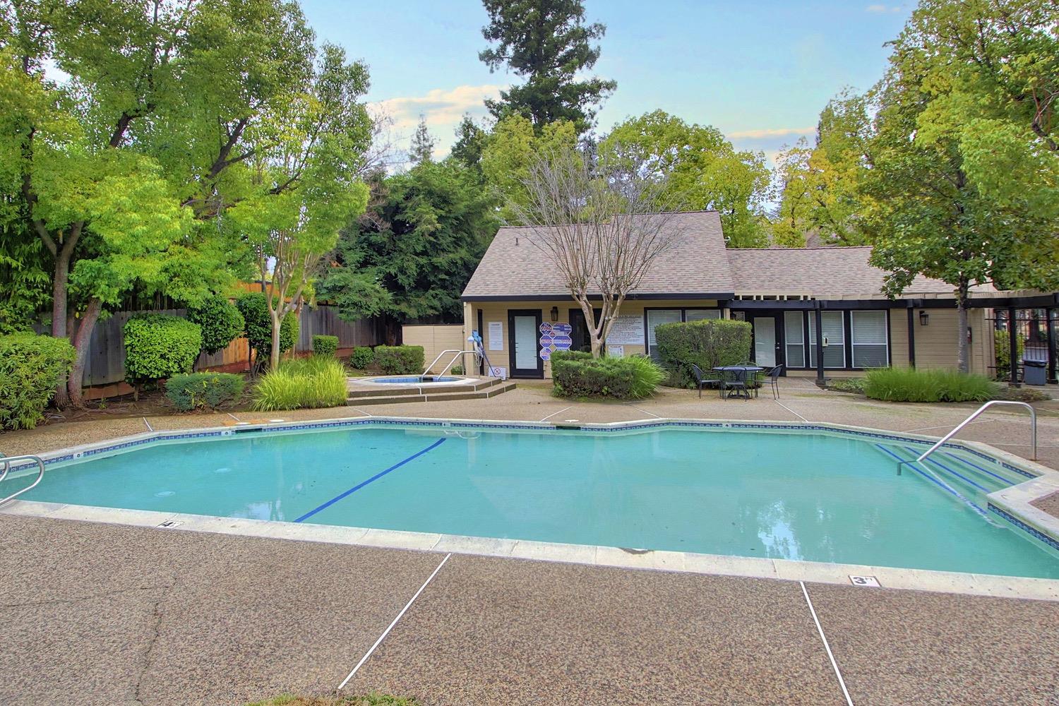 9237 Madison Avenue Orangevale, CA 95662 - Photo 35 of 40 a house view with swimming pool in front of it