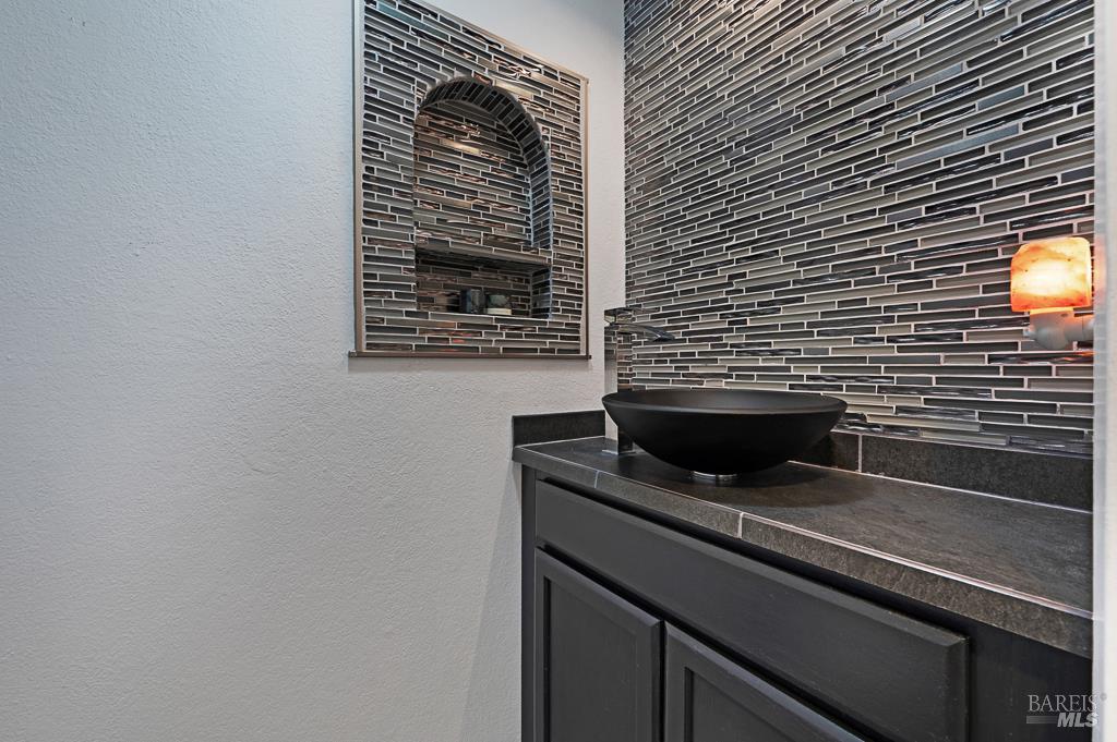 1749 Las Raposas Court Santa Rosa, CA 95409 - Photo 14 of 31 a kitchen with a sink and a microwave