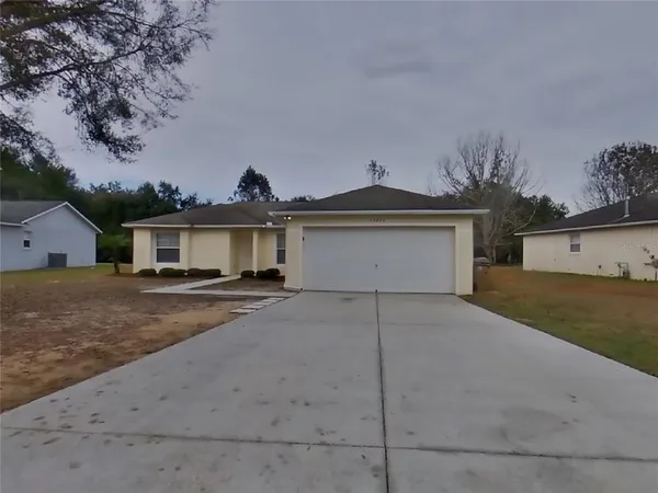 front view of a house with a street