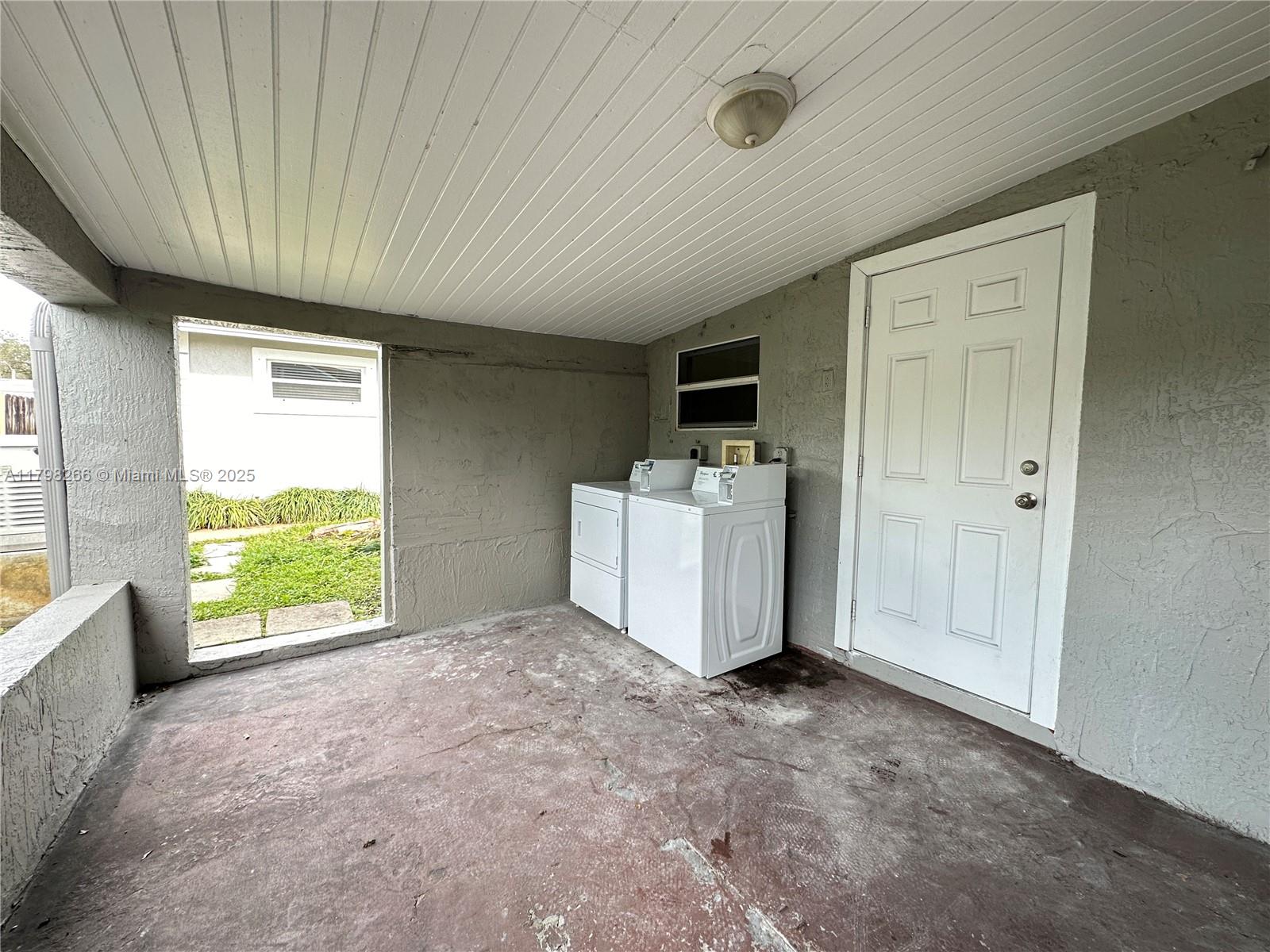 2811 Northwest 88th Street, Unit 1 Miami, FL 33147 - Photo 10 of 10 a view of a kitchen with a sink and a window