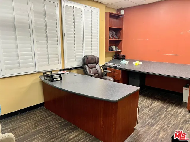 a room with a bed and a window