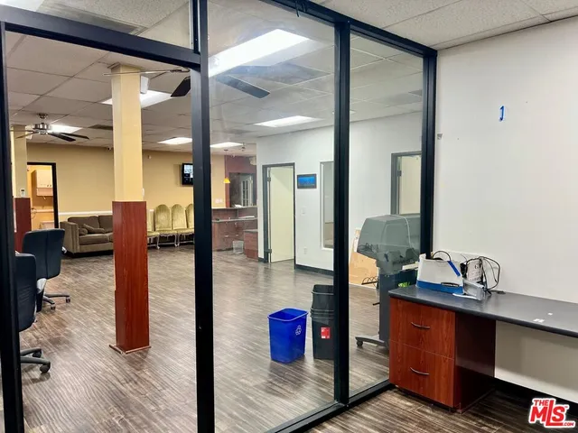 a bathroom with a tub shower and a sink