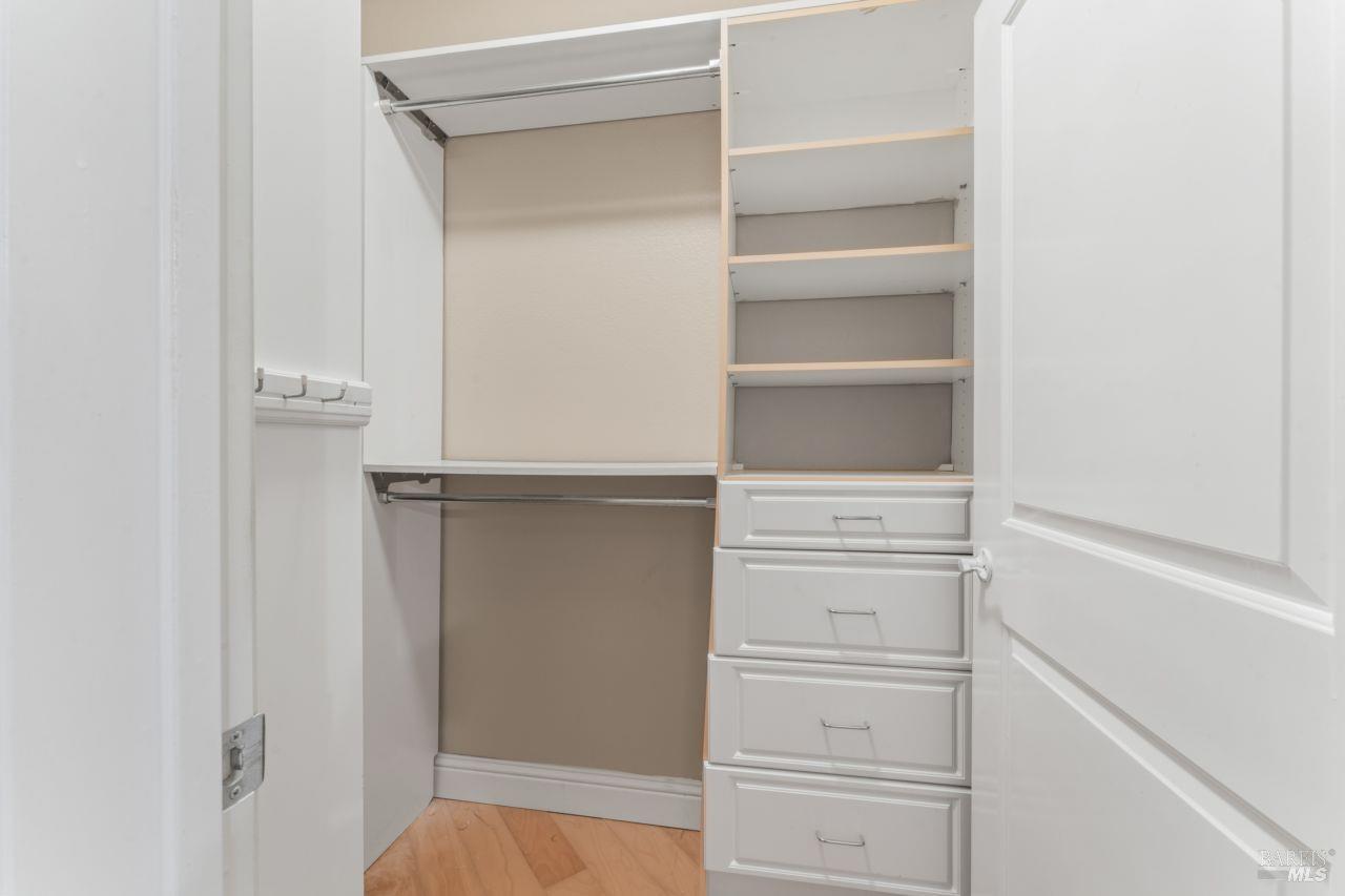 655 12th Street, Unit 311 Oakland, CA 94607 - Photo 21 of 29 a view of walk in closet with empty racks
