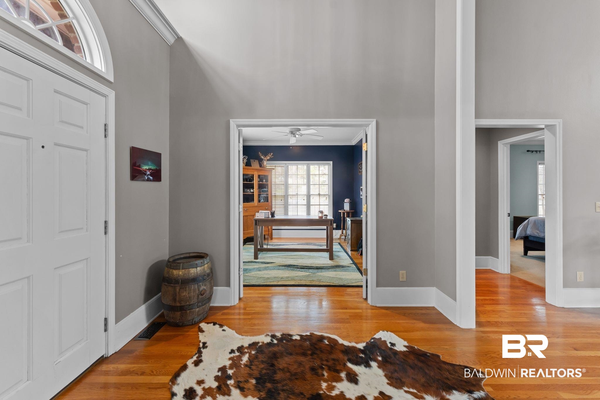 525 Norwood Road Monroeville, AL 36460 - Photo 3 of 55 Foyer entrance featuring light wood-style flooring, ceiling fan, and ornamental molding