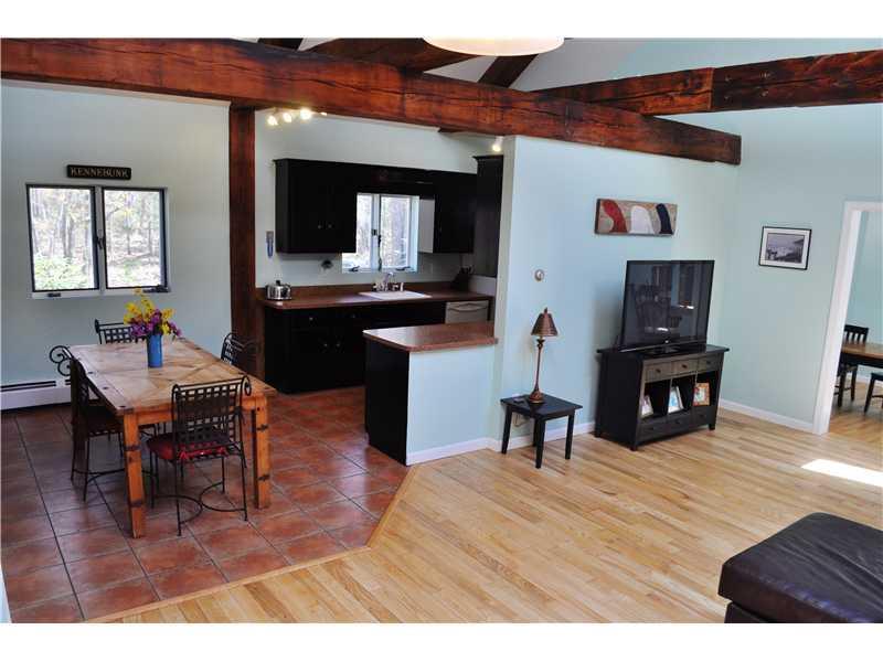 Living Room. Tile, hardwood, and...