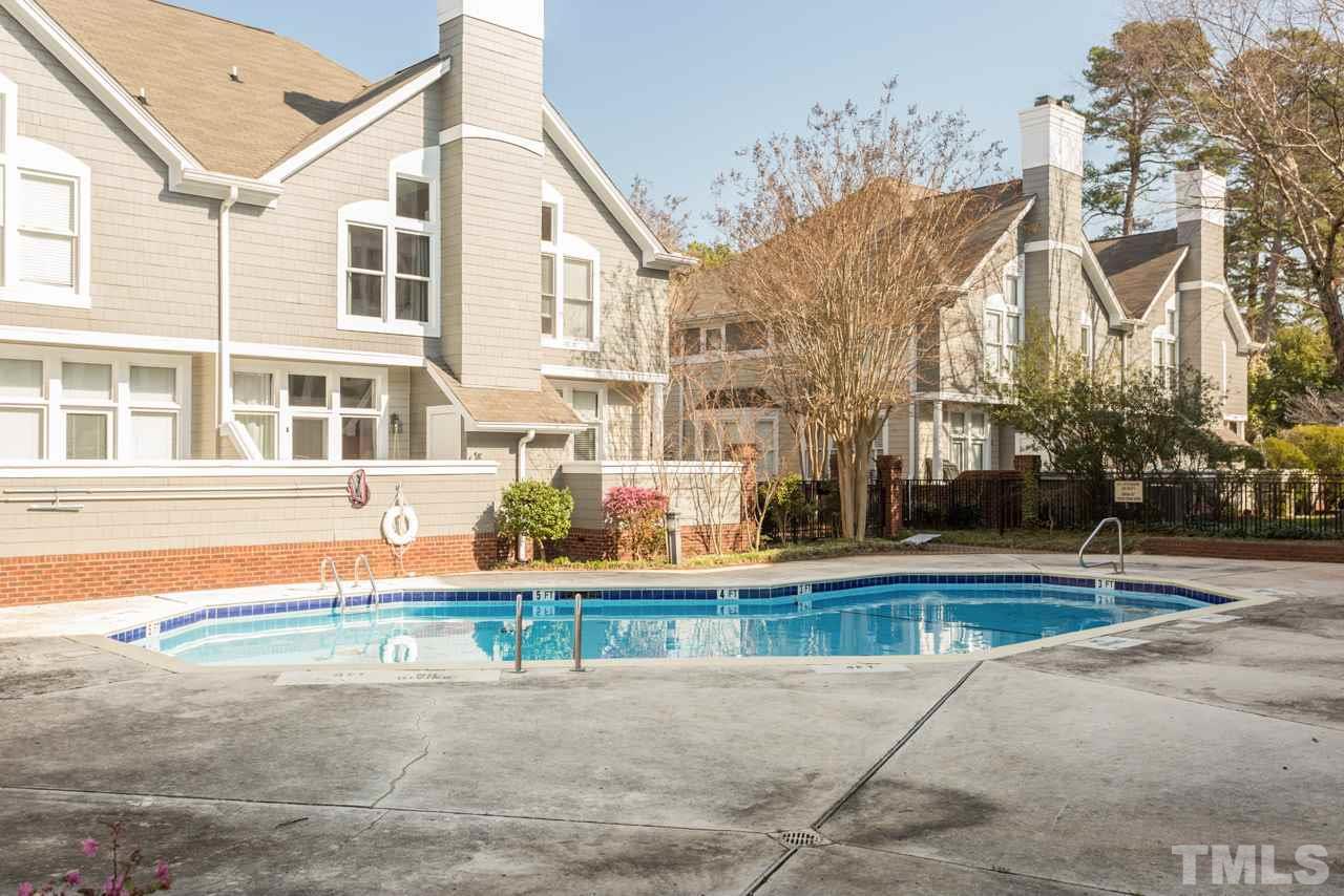 1000 Brighthurst Drive, Unit 301 Raleigh, NC 27605 - Photo 19 of 24 front view of a building with a yard
