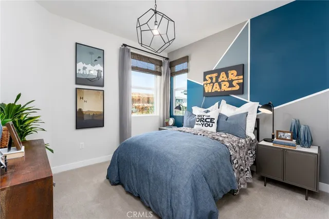 a bedroom with bed and window