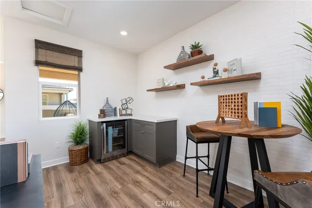 a workspace with furniture and window