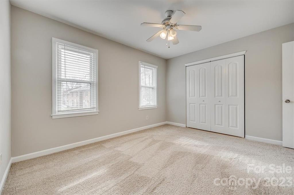 3722 Park Road, Unit I Charlotte, NC 28209 - Photo 18 of 27 a view of an empty room with a window
