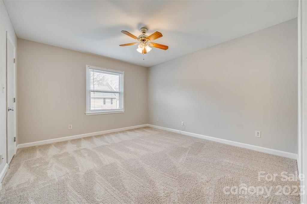 3722 Park Road, Unit I Charlotte, NC 28209 - Photo 21 of 27 a view of an empty room with a window