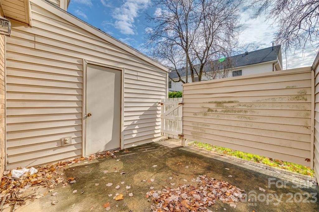 3722 Park Road, Unit I Charlotte, NC 28209 - Photo 25 of 27 a view of a house with a yard