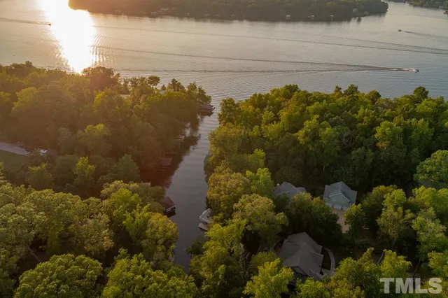 an aerial view of residential house with an outdoor space