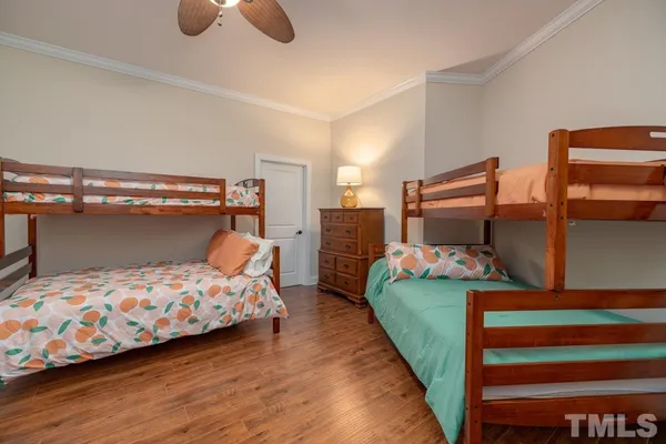 a balcony with furniture and a potted plant