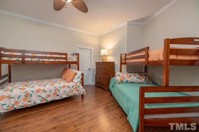 a balcony with furniture and a potted plant