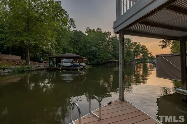 a view of a street with a building and a street sign