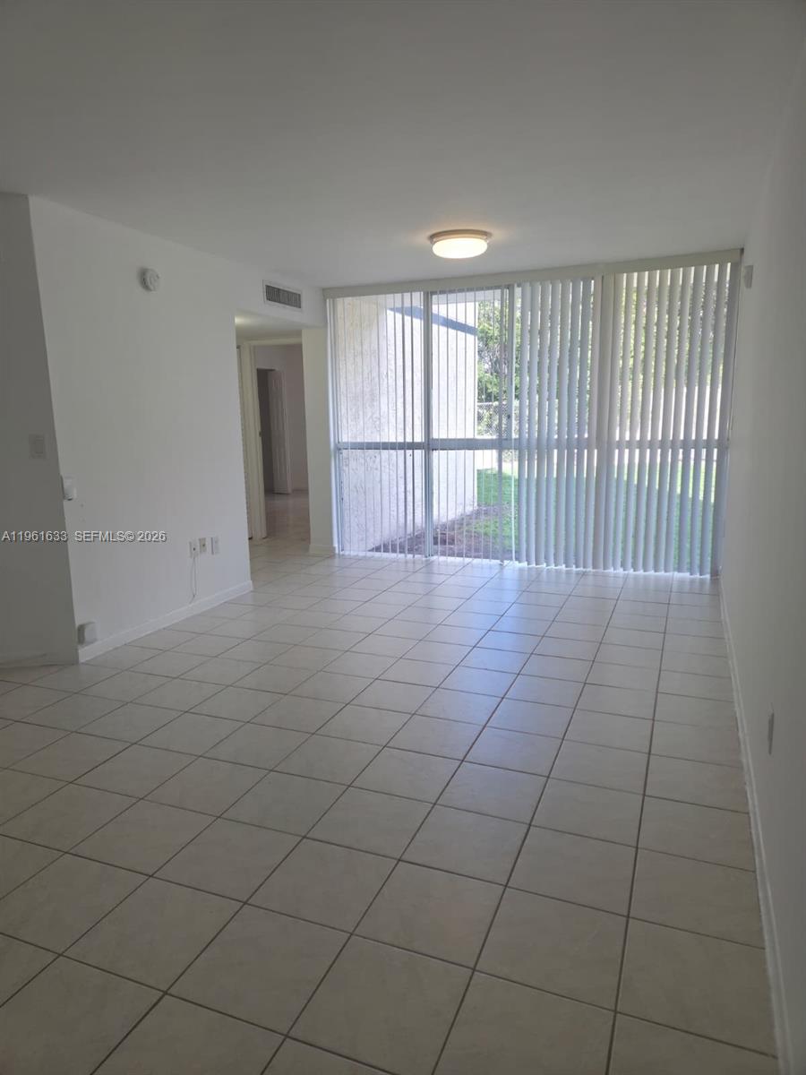 7075 Northwest 186th Street, Unit C104 Hialeah, FL 33015 - Photo 8 of 23