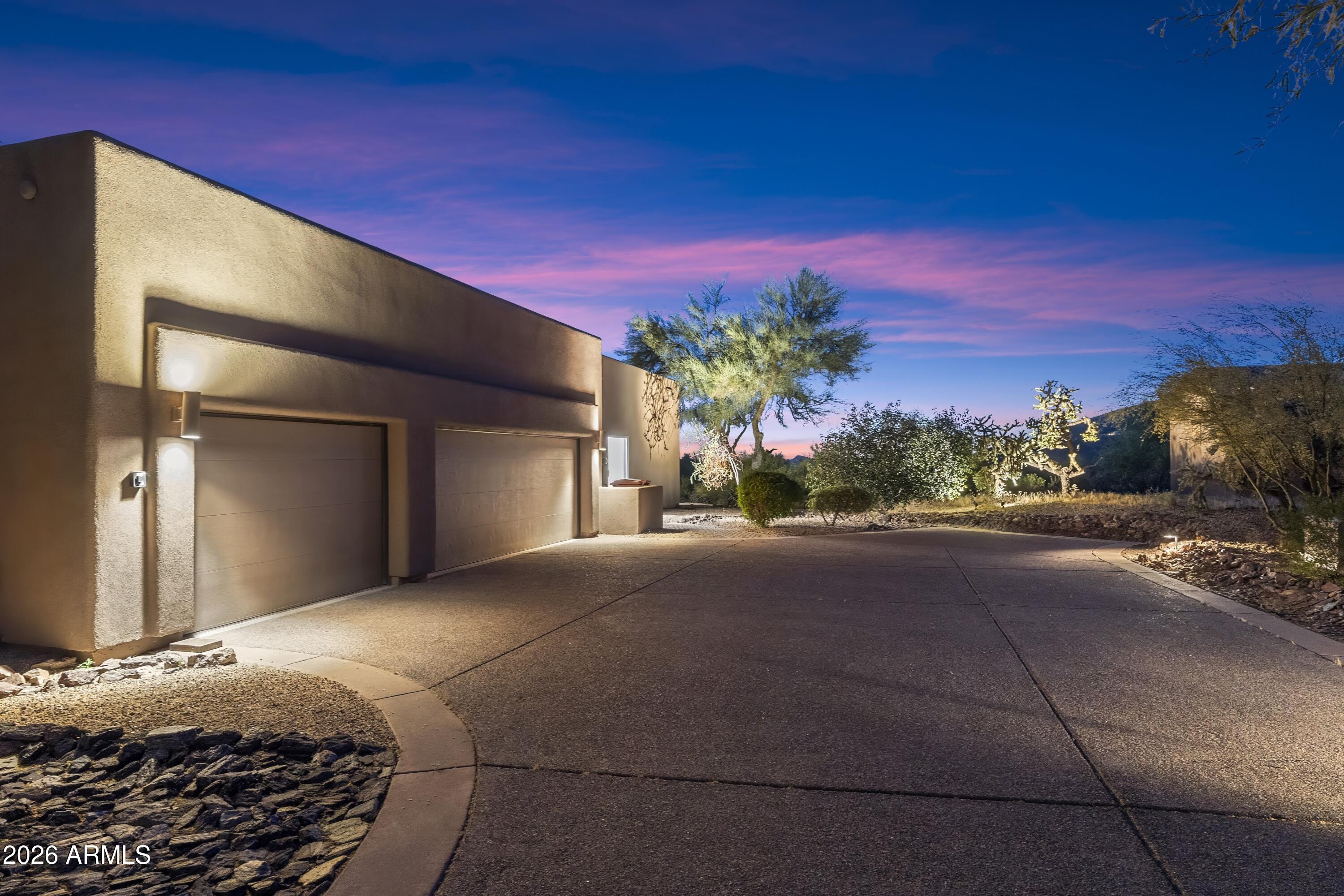 10046 East Hidden Valley Road Scottsdale, AZ 85262 - Photo 60 of 64 a view of a house with a street