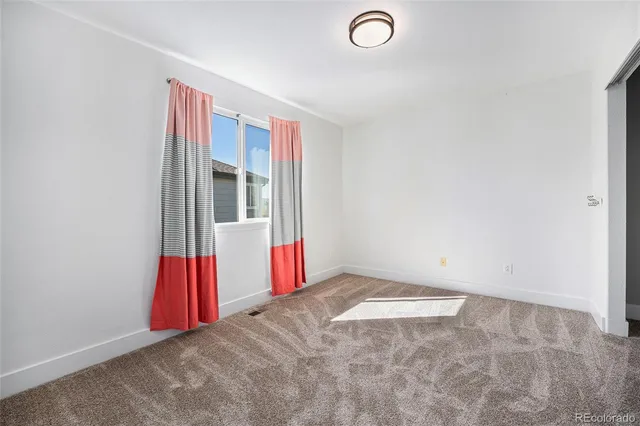 a view of a big room with an empty room