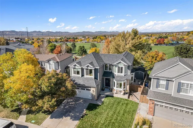aerial view of a house with a garden