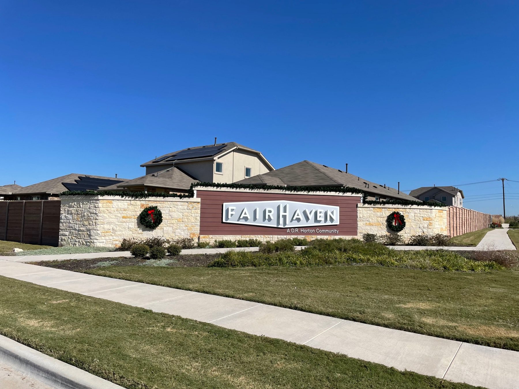 216 Frederick Drive Georgetown, TX 78626 - Photo 5 of 22 Community sign featuring fence and a lawn