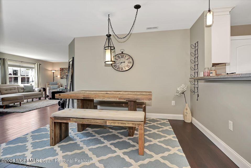 13 Racquet Road Wall, NJ 07719 - Photo 13 of 20 a view of a hallway with seating area