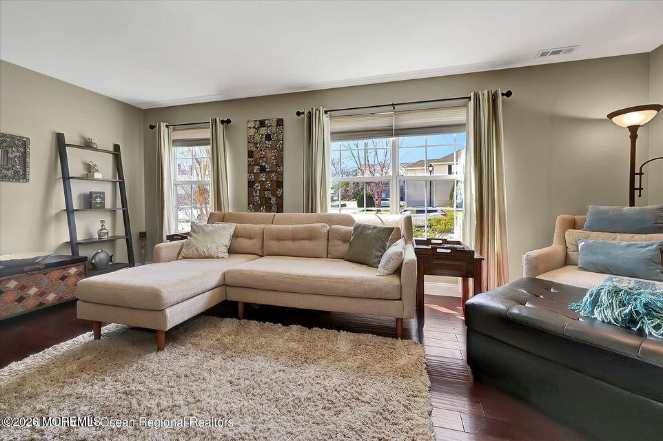 13 Racquet Road Wall, NJ 07719 - Photo 10 of 20 a living room with furniture and a large window