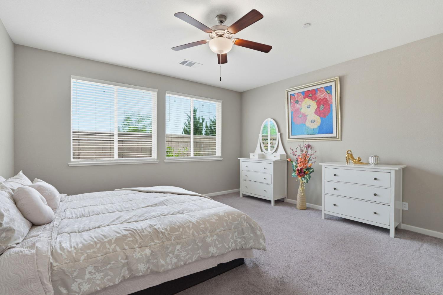 1816 Fire Power Avenue Manteca, CA 95337 - Photo 19 of 38 a bedroom with a bed and a window