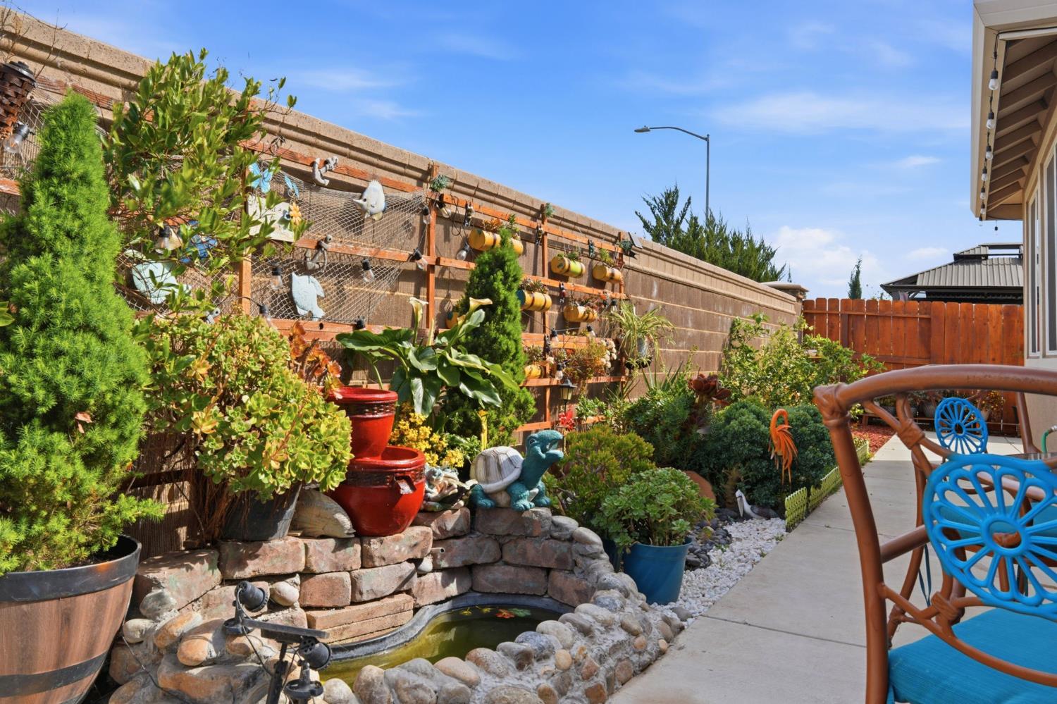 1816 Fire Power Avenue Manteca, CA 95337 - Photo 35 of 38 a view of a backyard with sitting area