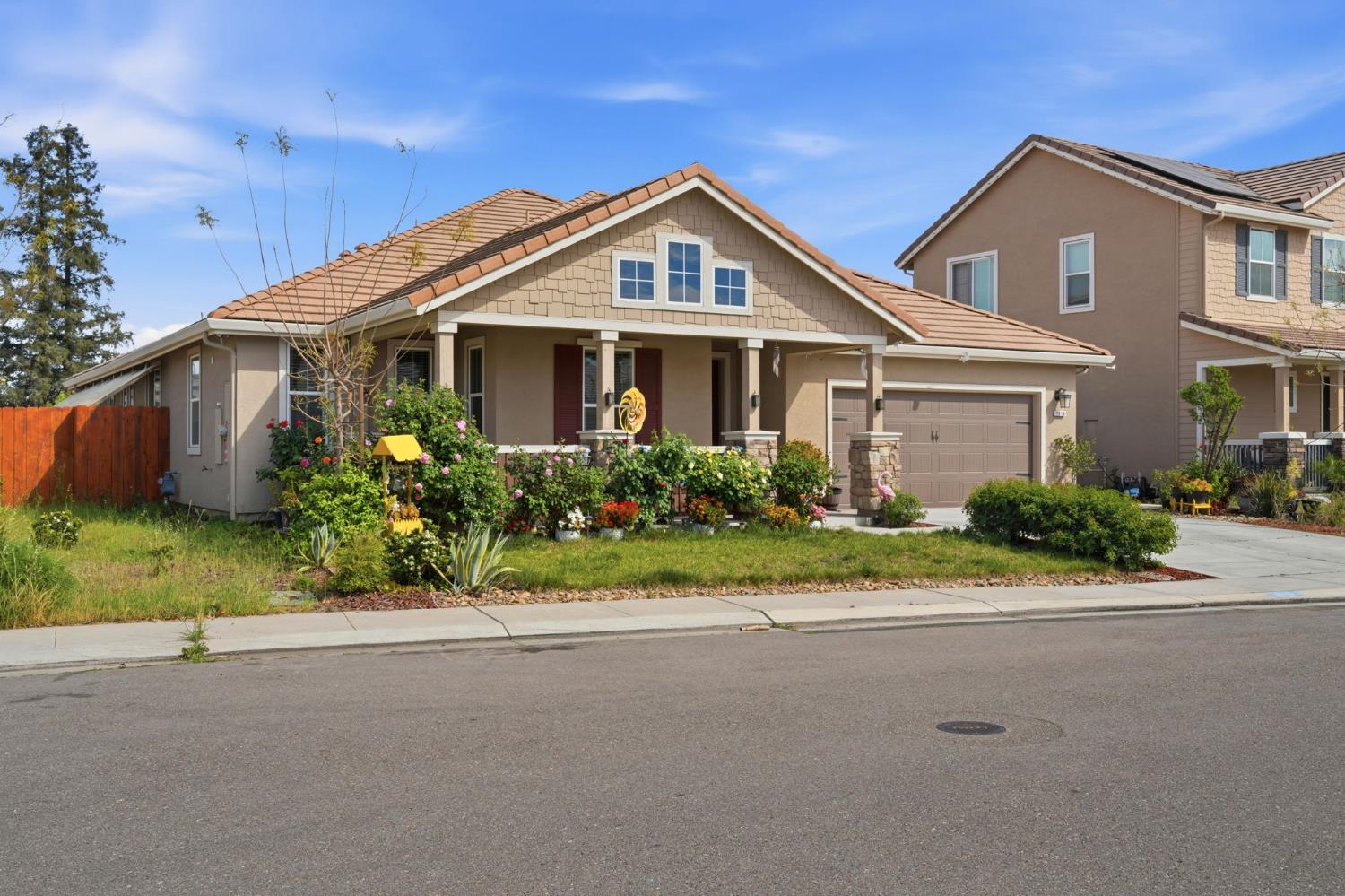 1816 Fire Power Avenue Manteca, CA 95337 - Photo 4 of 38 a front view of house with yard and green space