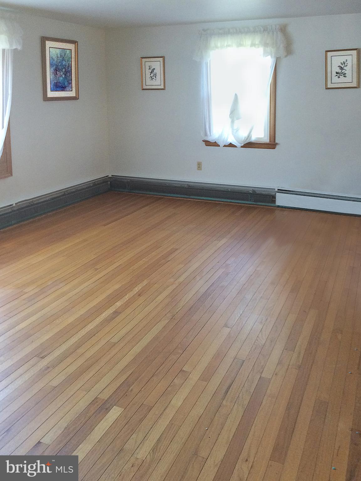228 Pratts Dam Road Coatesville, PA 19320 - Photo 7 of 28 Beautiful Hardwood floors under the carpet.