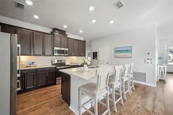 a view of living room with furniture and flat screen tv