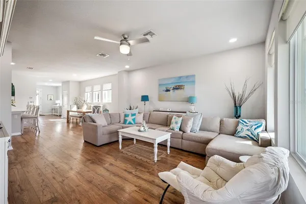 a bedroom with a bed and a potted plant