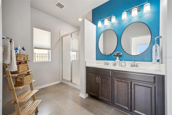a view of a bathroom from the hallway