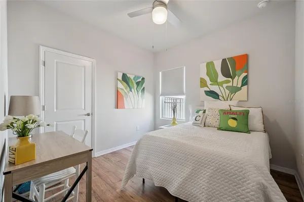 a bedroom with a bed and a view of bathroom