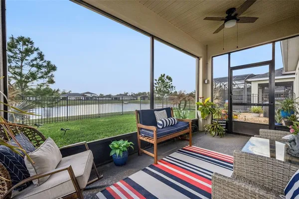 a front view of a house with a garden and porch