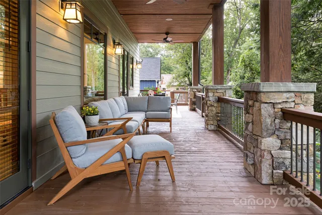 a view of a chair and table in the balcony