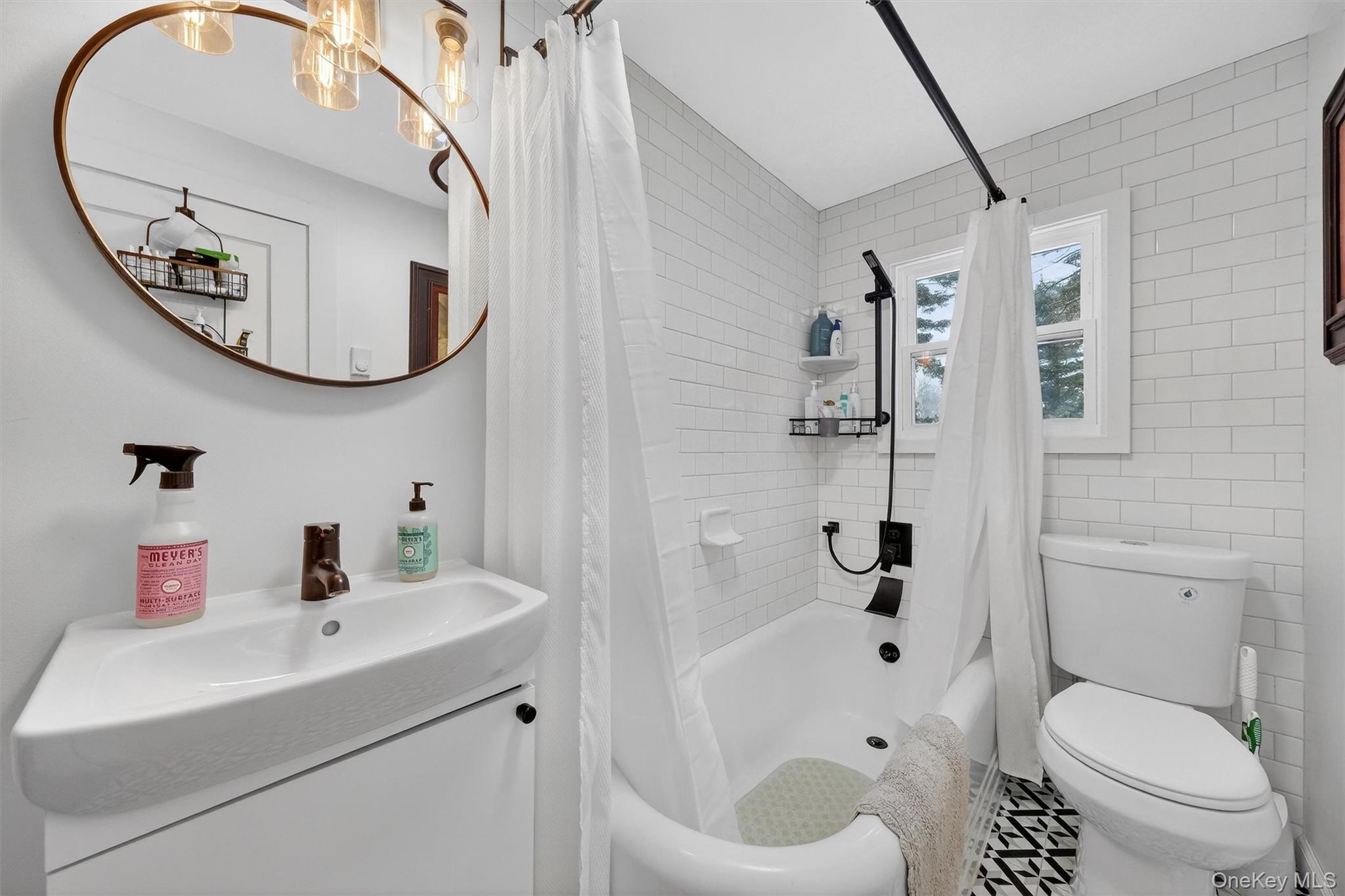 36 Vassar View Road Poughkeepsie, NY 12603 - Photo 18 of 31 a bathroom with a sink a toilet and a mirror