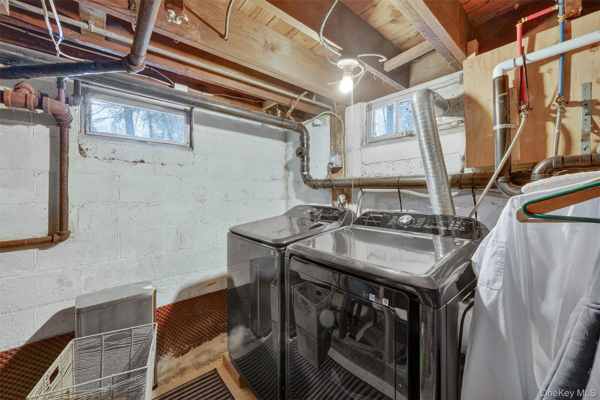 36 Vassar View Road Poughkeepsie, NY 12603 - Photo 20 of 31 a utility room with a sink dryer and washer