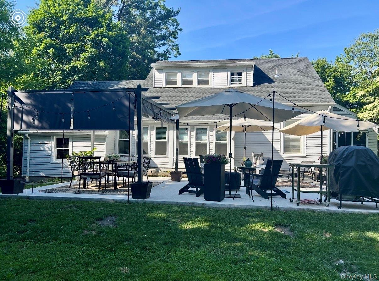 36 Vassar View Road Poughkeepsie, NY 12603 - Photo 26 of 31 a front view of a house with a yard fire pit and outdoor seating
