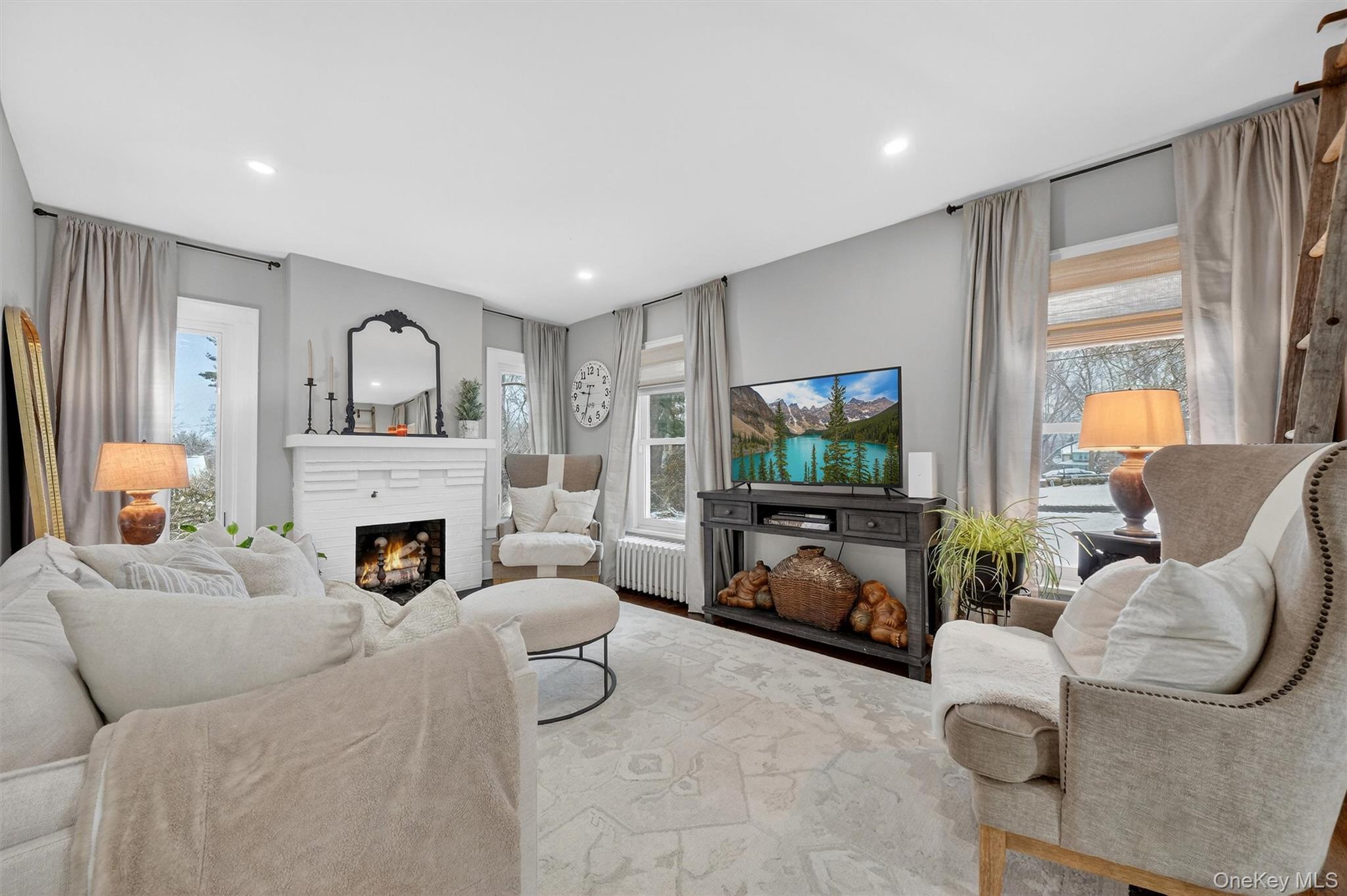 36 Vassar View Road Poughkeepsie, NY 12603 - Photo 8 of 31 a living room with furniture and a flat screen tv