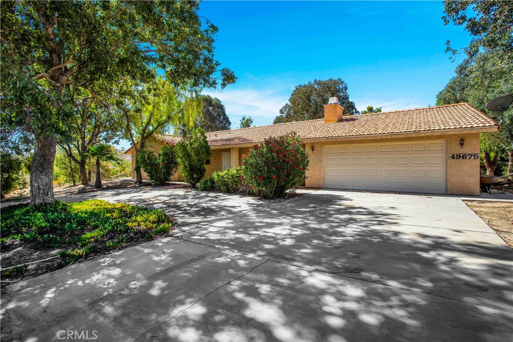 49675 Recuerdo Lane Morongo Valley, CA 92256 - Photo 1 of 1 a view of a house with a yard