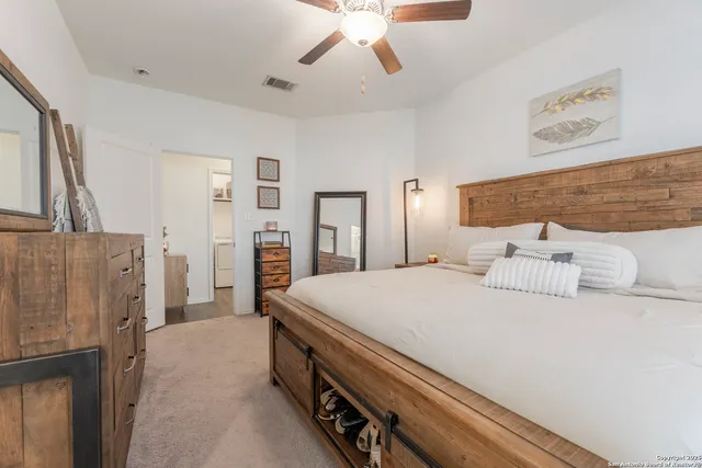 a bathroom with a sink a mirror and a shower