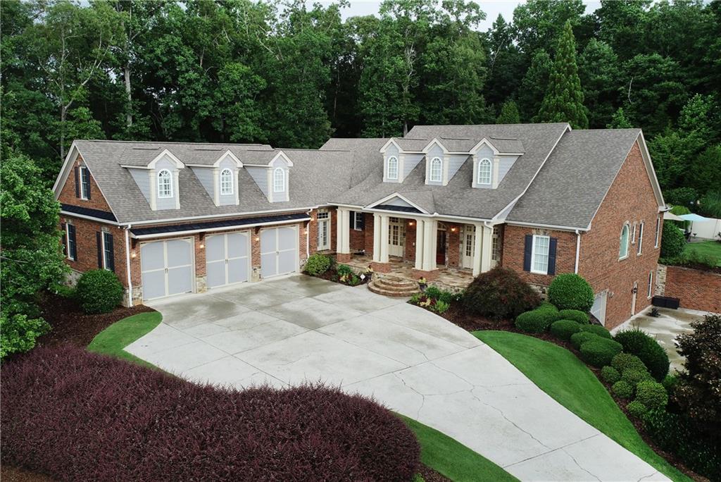5266 Hopewell Church Road Gainesville, GA 30506 - Photo 1 of 1 a aerial view of a house next to a yard