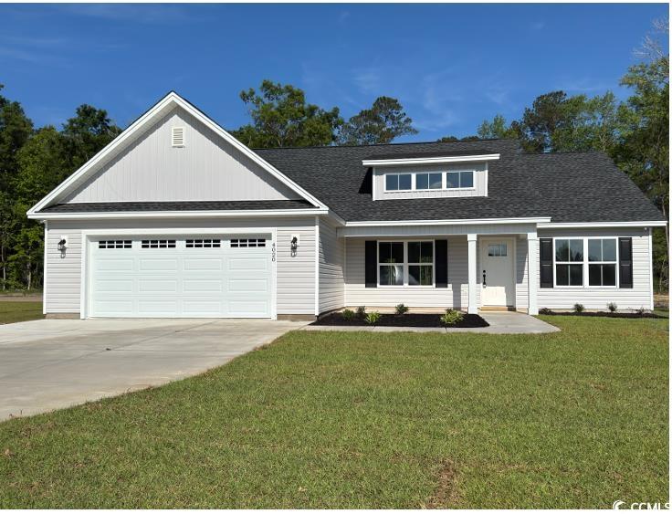 4020 Copperhead Road Conway, SC 29527 - Photo 1 of 16 View of front of home featuring a front lawn, a sh