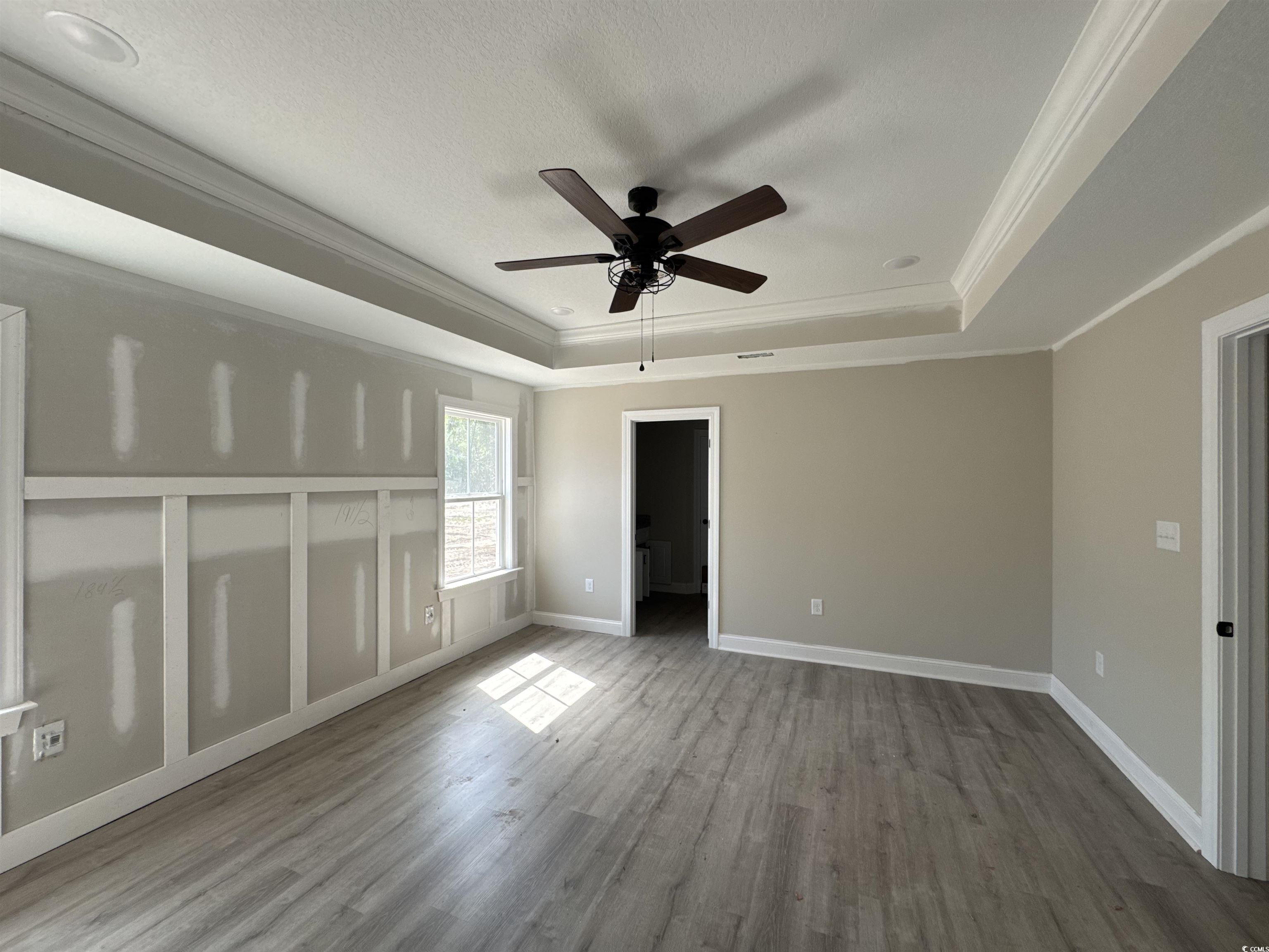 4020 Copperhead Road Conway, SC 29527 - Photo 13 of 16 Unfurnished bedroom featuring a raised ceiling, cr