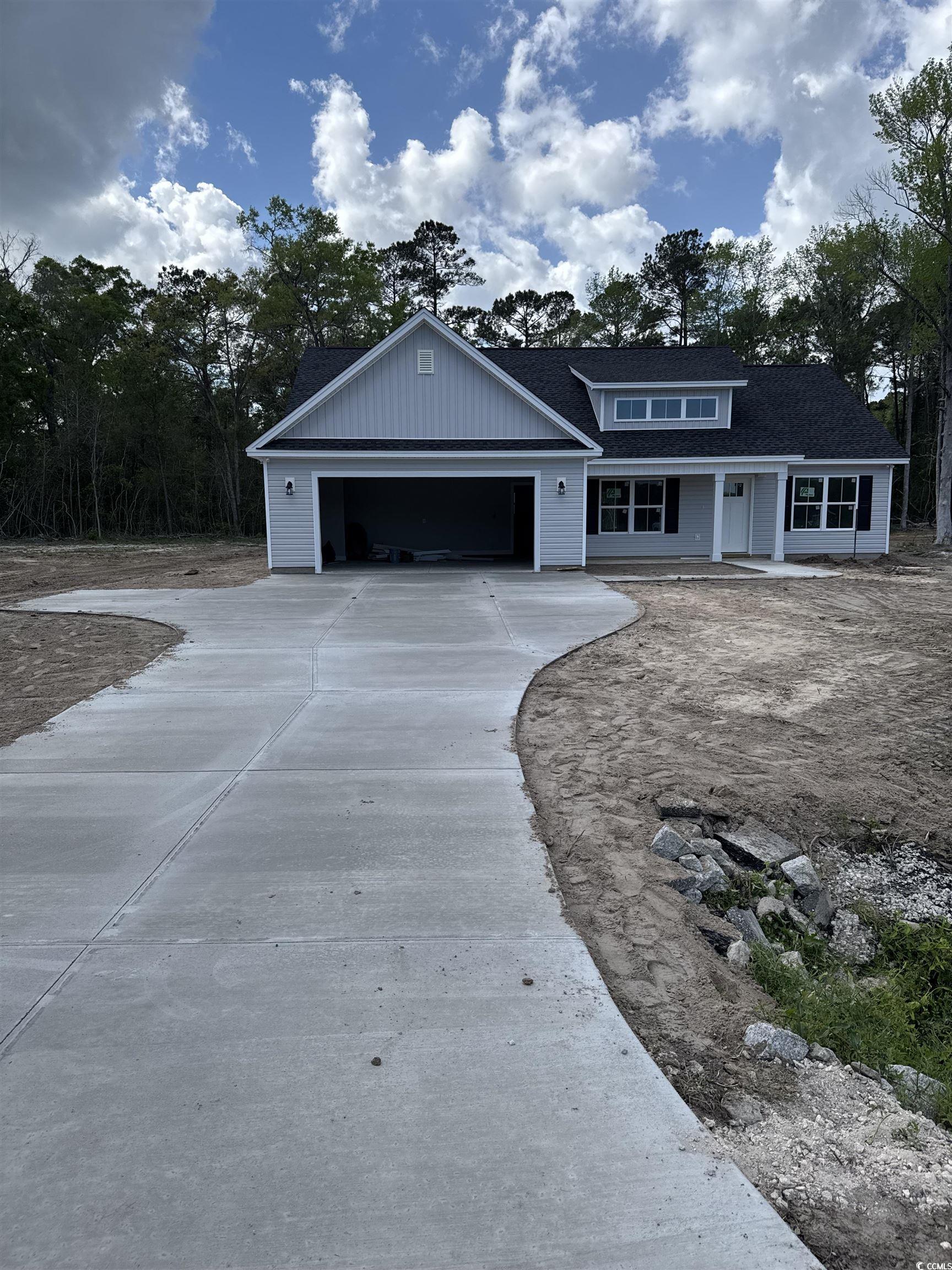 4020 Copperhead Road Conway, SC 29527 - Photo 2 of 16 View of front of house featuring driveway, a garag