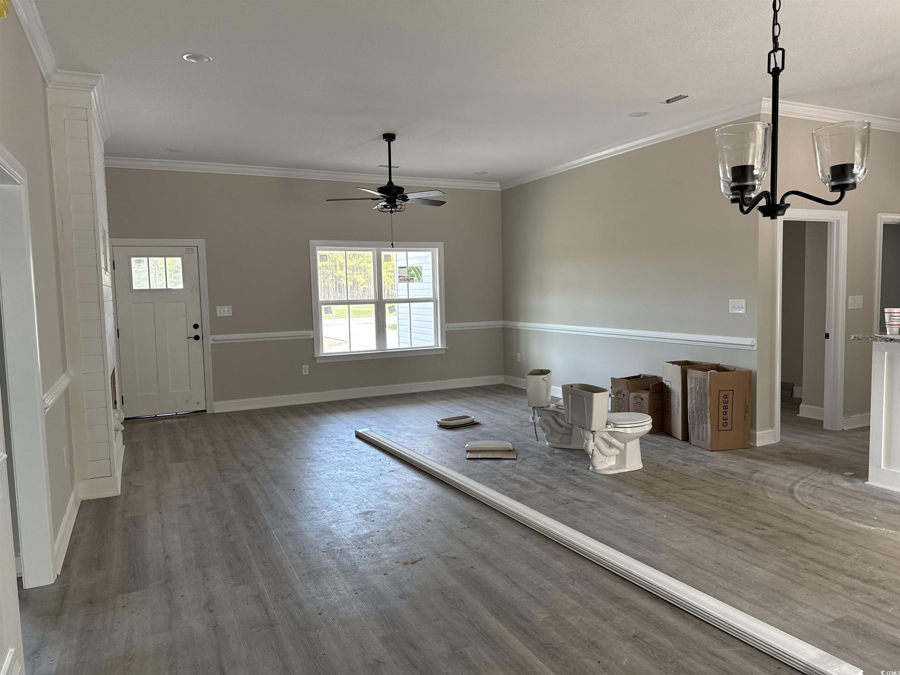 4020 Copperhead Road Conway, SC 29527 - Photo 5 of 16 Unfurnished dining area with baseboards, wood fini